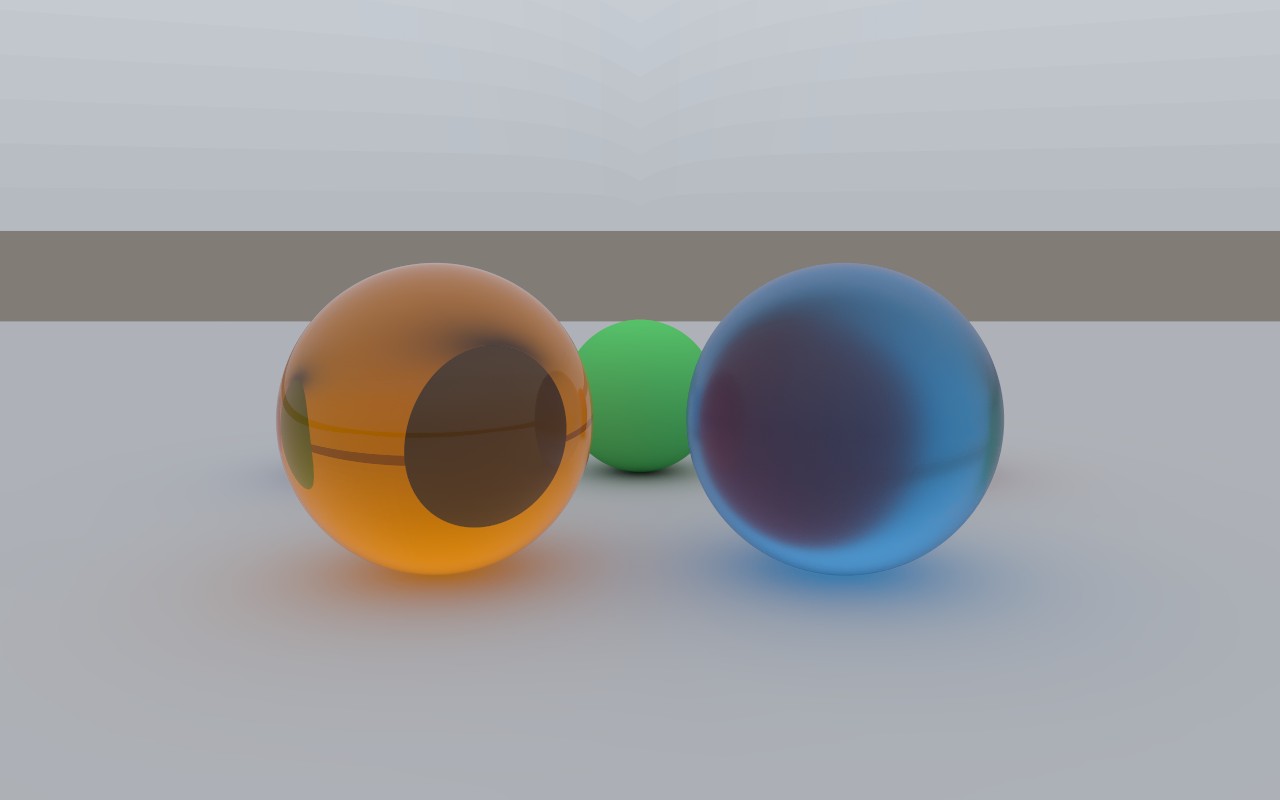 A ball of amber glass and a frosted ball of blue liquid on a pale floor