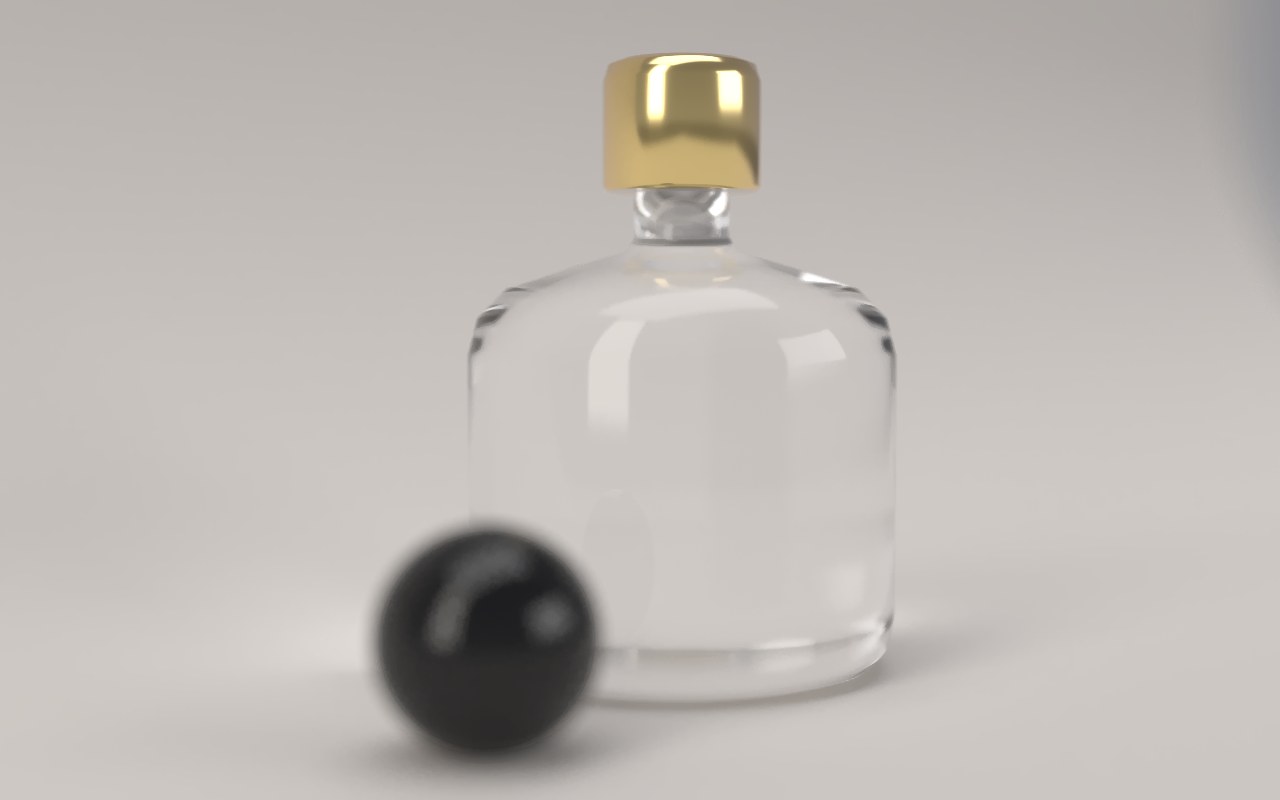 The perfume bottle sharp, with the stone in front and the backdrop softly blurred